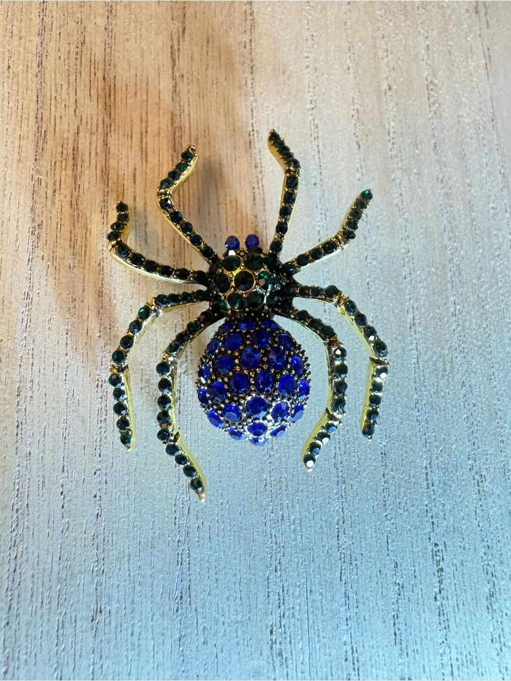 Gold-tone Spider Brooch with Blue and Green Rhinestones